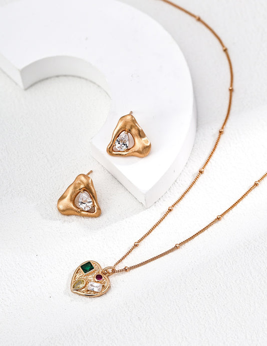 Triangular Gleam Studs — Matte Gold & Sparkling Zircon