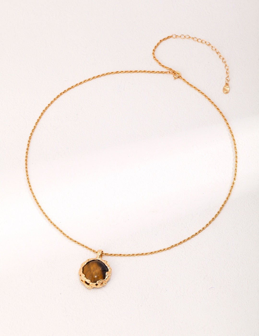 Earth Glow Pendant — Tiger’s Eye Stone & Gold Carved Setting