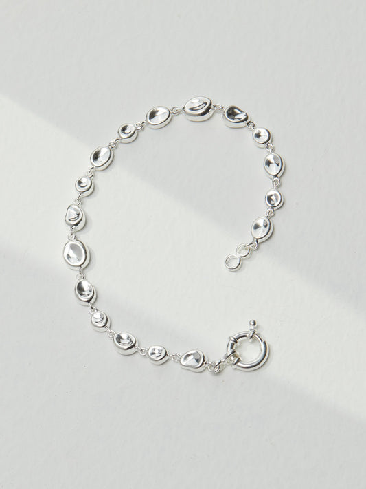 Molten Gleam — Textured Silver Bracelet